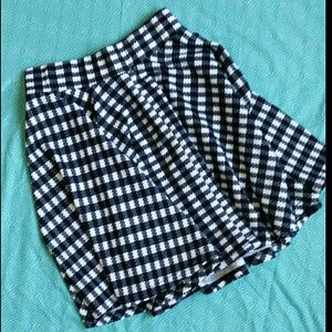 Black and white checkered A-line style midi skirt